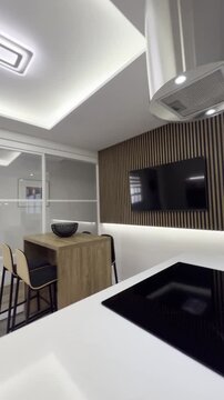 cocina de dise&ntilde;o con isla . zona de lavado y desayunado . almacenaje y electrodomesticos integrados 