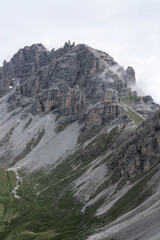 hiking over rocks in the Alps