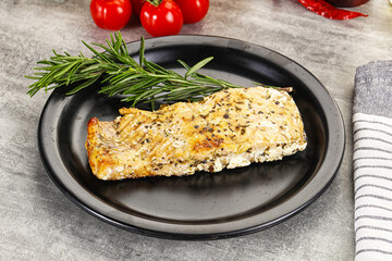 Baked salmon fish served rosemary