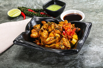 Vietnamese cuisine - fried frog with vegetables
