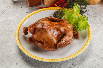 Baked small chicken with spices