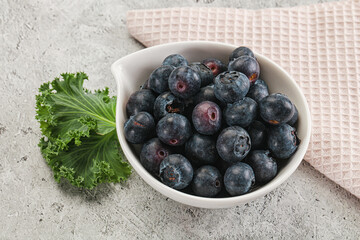 Sweet ripe blueberry on the bowl