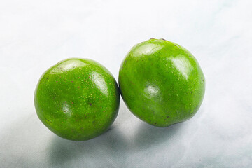 Two ripe green exotic avocado fruit