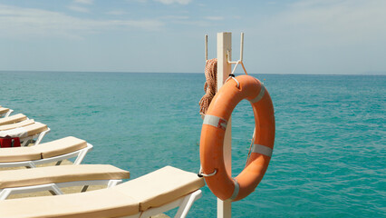 beach ocean save sea equipment lifebuoy lifesaver rescue lifeguard help safety sand vacation