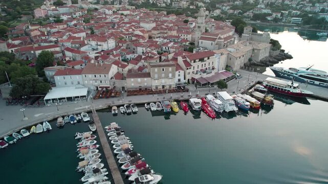 Aerial Reveal of Old Town Krk, Croatia, with Calm Waves