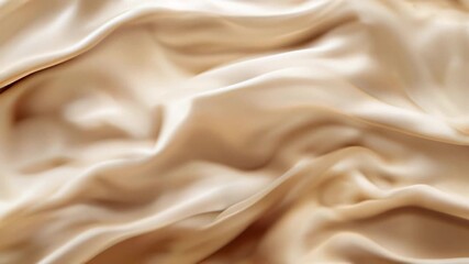 Silky smooth beige fabric background perfect for slow motion video and luxury designs