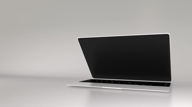 A white laptop with a green screen on a white background. Laptop opens green chroma key display, mock-up monitor for website template presentation or game