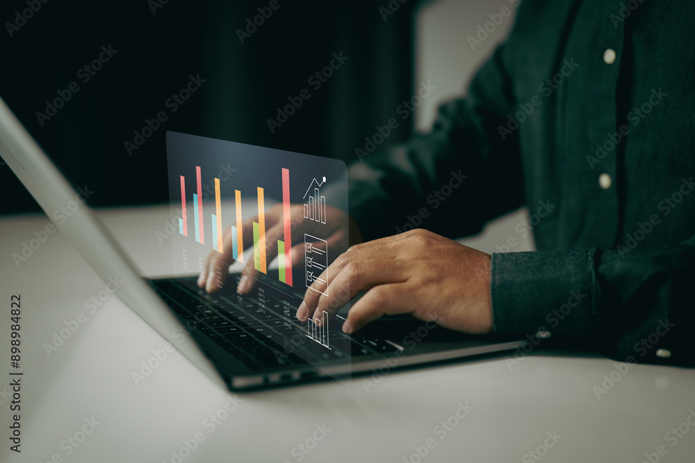 Fototapete Person typing on a laptop with bar charts and data visualizations floating above. It represents data analysis, business intelligence, and the use of digital tools for performance tracking.