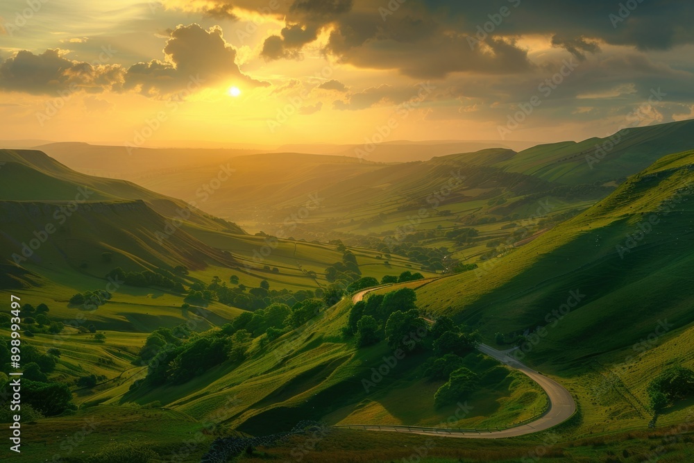 Poster a winding road runs through a lush green valley with hills and trees in the background