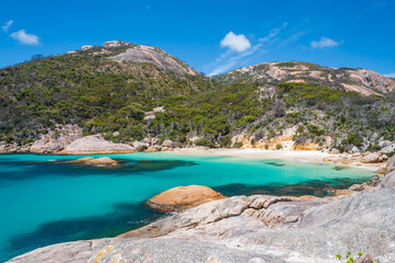 The pristine beauty of Two Peoples Bay, Australia. Turquoise waters, white sandy beaches, and rugged landscapes make it a perfect escape for nature lovers and adventure seekers.