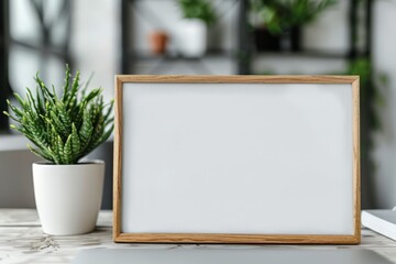 Stylish wooden frame with a blank canvas, perfect for decoration or personalization in modern home or office settings.