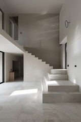 Fototapeta premium Modern Minimalist Home Interior Design With White Marble Stairs And Natural Light