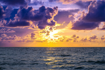 Seascape with dramatic sky and colorful clouds. Sky over sea water landscape. Stormy dramatic sky. Scenic seascape at sea.