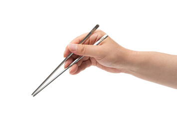 쇠 젓가락을 든 남성의 손 누끼(Close-up of a man's hand holding metal chopsticks)