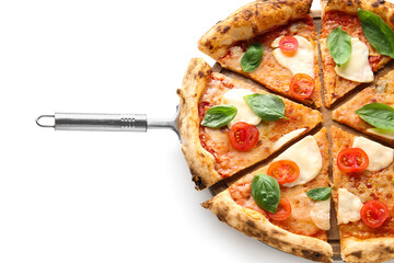 Wooden board with pieces of tasty pizza Margarita and spatula on white background