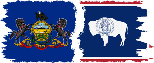 Wyoming and Pennsylvania states grunge brush flags connection, vector