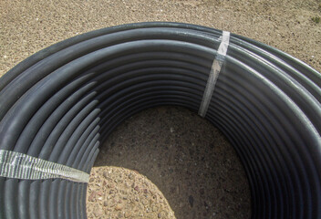 Roll of tubing for self-compensating drippers