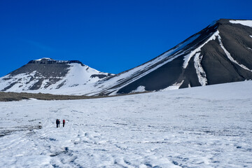 Hiking through Svalbard glacier in summer time