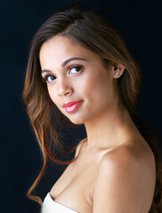 Fototapeta premium Portrait, smile and woman with makeup in studio for beauty shine, treatment or satisfaction. Lipstick, feminine and female person with pride on black background for cosmetics, results or glowing skin
