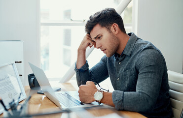 Stress, laptop and business man reading bad news for debt or bankruptcy at creative startup. Computer, mistake and sad employee with email for taxes, fail or thinking of challenge with job rejection