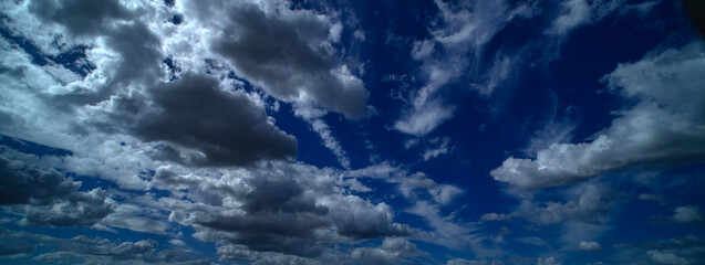 Summer clouds. Cloudy sky. Vivid cyan blue sky with clouds in environment day horizon skyline view....