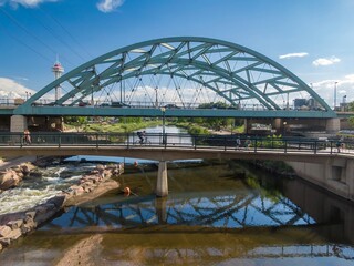 Fototapeta premium South Plate River and Speer Boulevard bridge in downtown Denver, Colorado, United States of America.