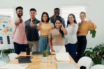 Thumbs up, portrait and people in office for business, success for planning and agreement. Group, collaboration and diversity in creative agency for design, review and happy for teamwork or project