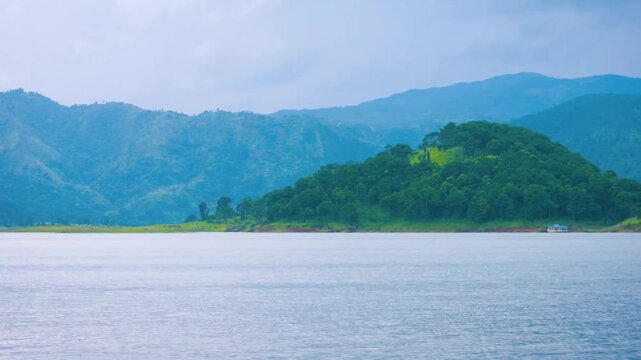 Aerial drone View of Mountain & Lake Drone footage, of river and beautiful natural green forests on a sunny summer day in, Umiam Lake, Meghalaya
