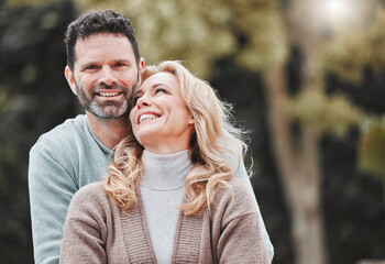 Couple, portrait and hug for outdoor laughter, love and affection for spouse on holiday. Mature people, funny humor and vacation for bonding on travel, embrace and countryside security in commitment