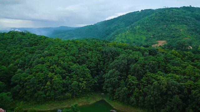 Aerial drone View of Mountain & Lake Drone footage, of river and beautiful natural green forests on a sunny summer day in, Umiam Lake, Meghalaya