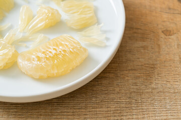 Fresh peeled pomelo, grapefruit or shaddock