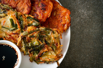 Pajeon or Korean pancake and Korean Kimchi pancake or Kimchijeon on white background