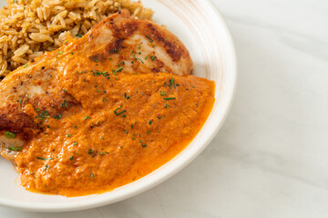 grilled chicken steak with red curry sauce and rice