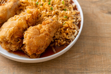 Korean instant noodles with fried chicken or Fried chicken ramyeon