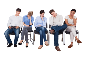 Multicultural business professionals waiting in row for interview in front