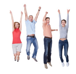 Obraz premium Celebrating Success: Two Couples Jumping in Joy