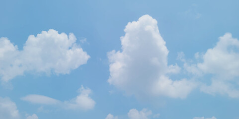 Beautiful blue sky clouds background, natural texture, sunny day. Sky view. Beautiful sunny sky. Background with clouds on blue sky. Clouds on blue sky.