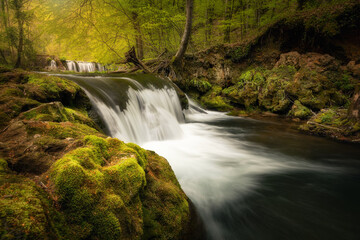 No AI, real photo beautiful waterfall in the forest, beautiful moss foreground, art, awe, hiking trekking