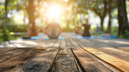 Wooden Table with Blurred Background of Yoga Practice in Nature