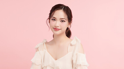 Beautiful young asian woman with clean fresh skin on pink background, Face care, Facial treatment, Cosmetology, beauty and spa, Asian women portrait.