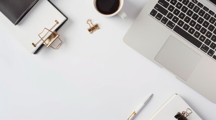Minimalist Office Desk Setup with Laptop, Notebooks, and Coffee