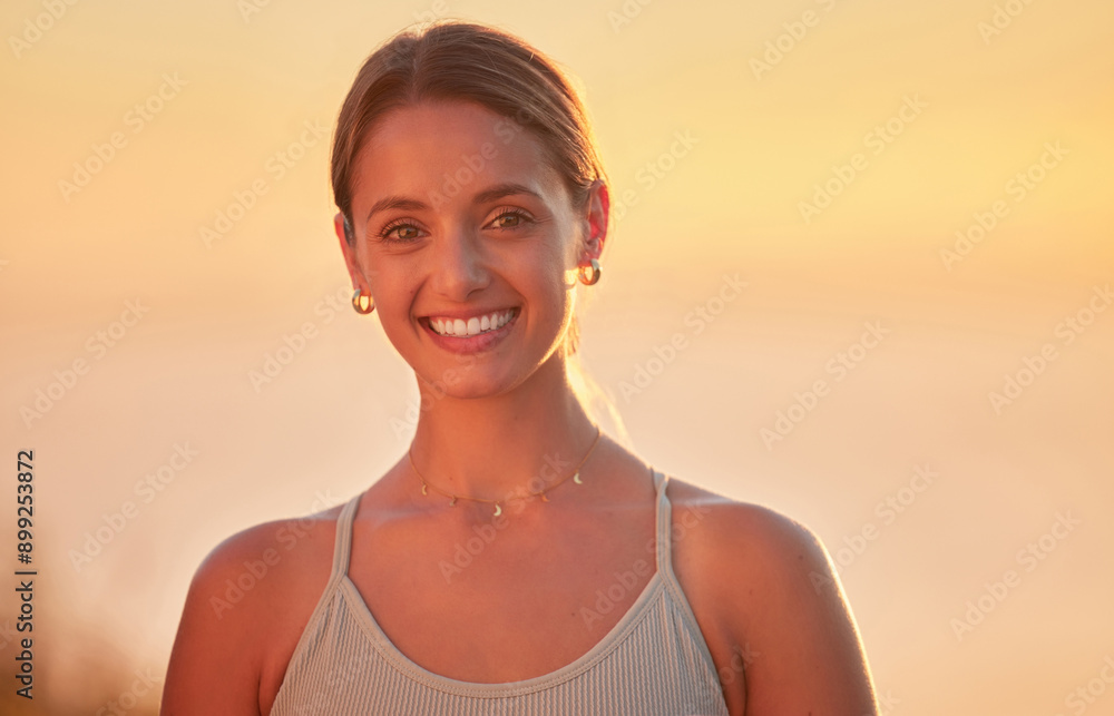 Poster Sunset, portrait and woman with smile for fitness, workout and ready for outdoor exercise with confidence. Female person, wellness and health for girl, training and wellbeing with pride for self care