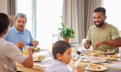 Family, together and eating at table in dining room with nutrition, lunch meal and love for bonding in home. Group of people, father and son with healthy food plate for brunch, conversation and care