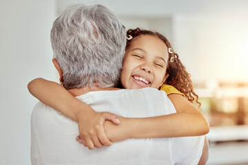 Grandmother, girl and hug for love in home, affection and bonding or care in apartment living room....