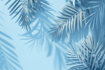 Blue background with palm leaves in a minimalistic, flat lay composition with soft lighting and a monochrome color scheme