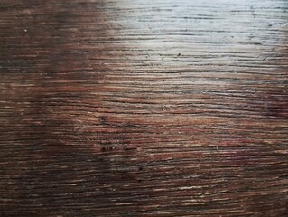 Fototapeta premium Close up view of brown table top background texture