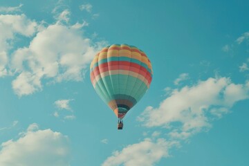 Fototapeta premium colorful hot air balloon flying on blue sky. adventure