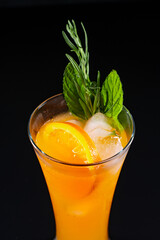  Orange juice or cocktail with ice cubes and alcohol 