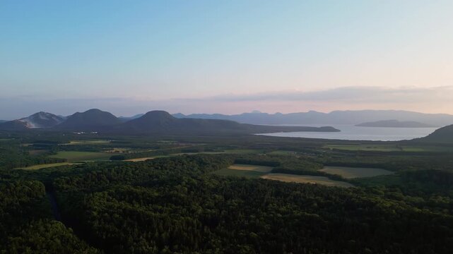 Akan-Mashu, Hokkaido: Dramatic aerial drone footage of the landscape of the Akan-Mashu National Park with the Lake Kussharo in Hokkaido in Japan in summer