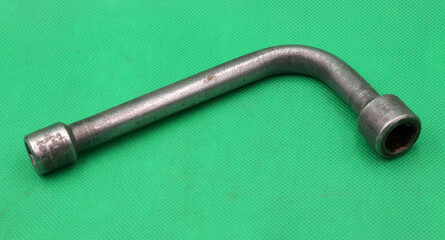 Wrench on a green table